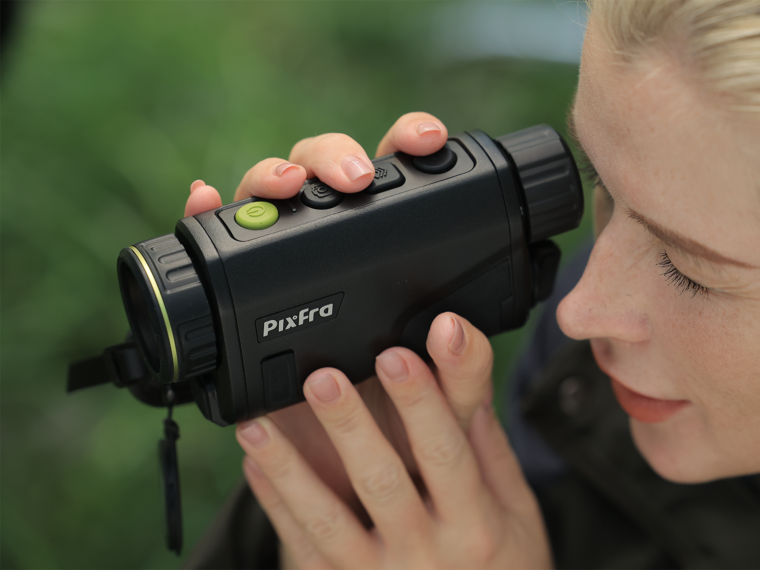 Image of lady holding Pixfra Arc A613 Thermal Imaging Monocular for Ecology & Surveying Blog Post Image - Reveal Wildlife